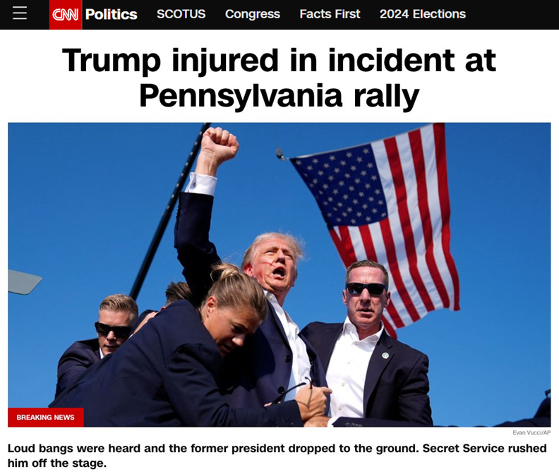 Schermata di notizia della CNN con titolo “Trump injured in incident at Pennsylvania rally”. Sottotitolo: “Loud bangs were heard and the former president dropped to the ground. Secret Service rushed him off the stage”